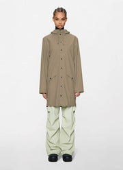 The Long Rain Jacket in beige by Rains