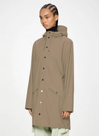 The Long Rain Jacket in beige by Rains