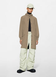 The Long Rain Jacket in beige by Rains