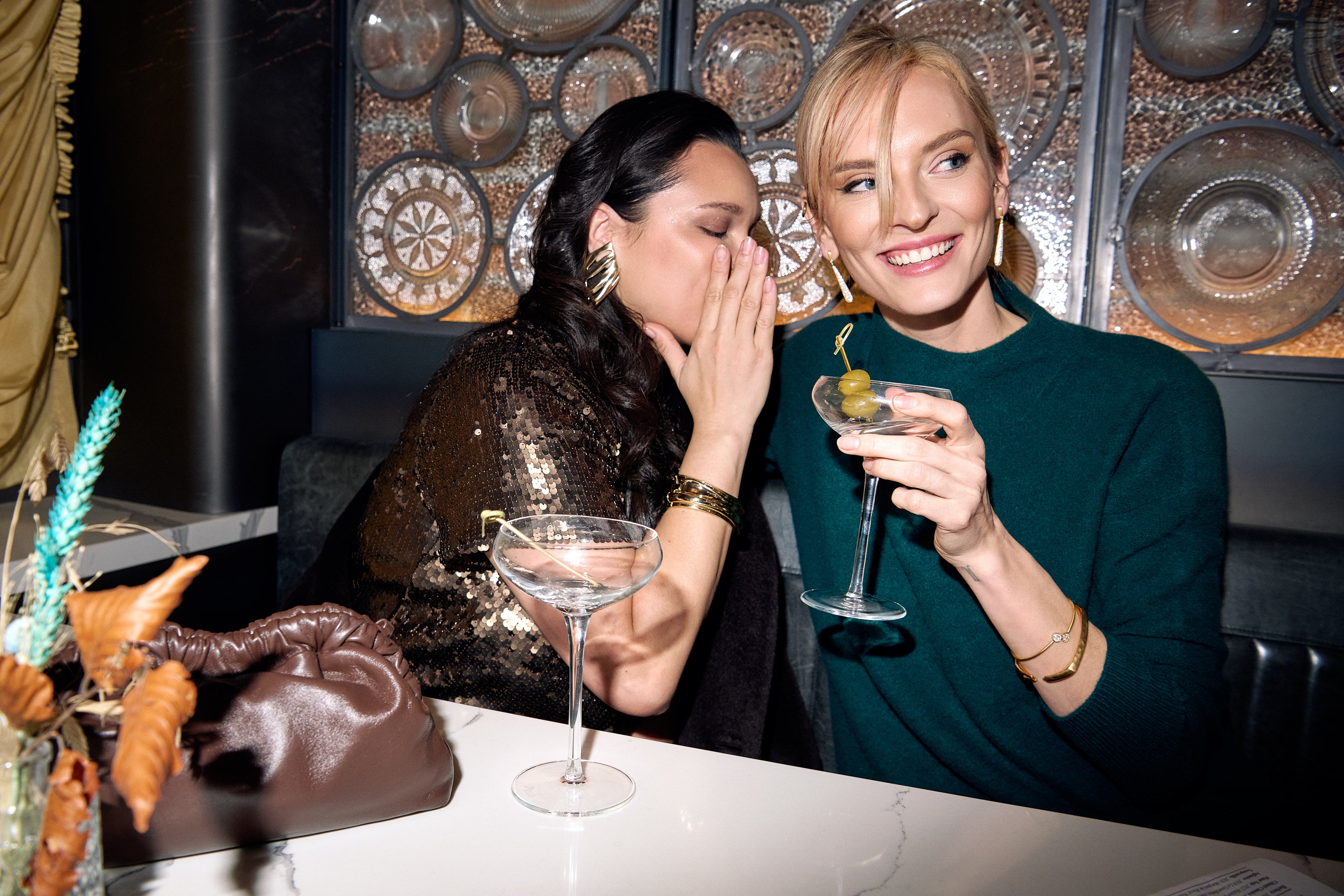 Two models seated at Piano Piano, styled in rag & bone and Vince for Andrews