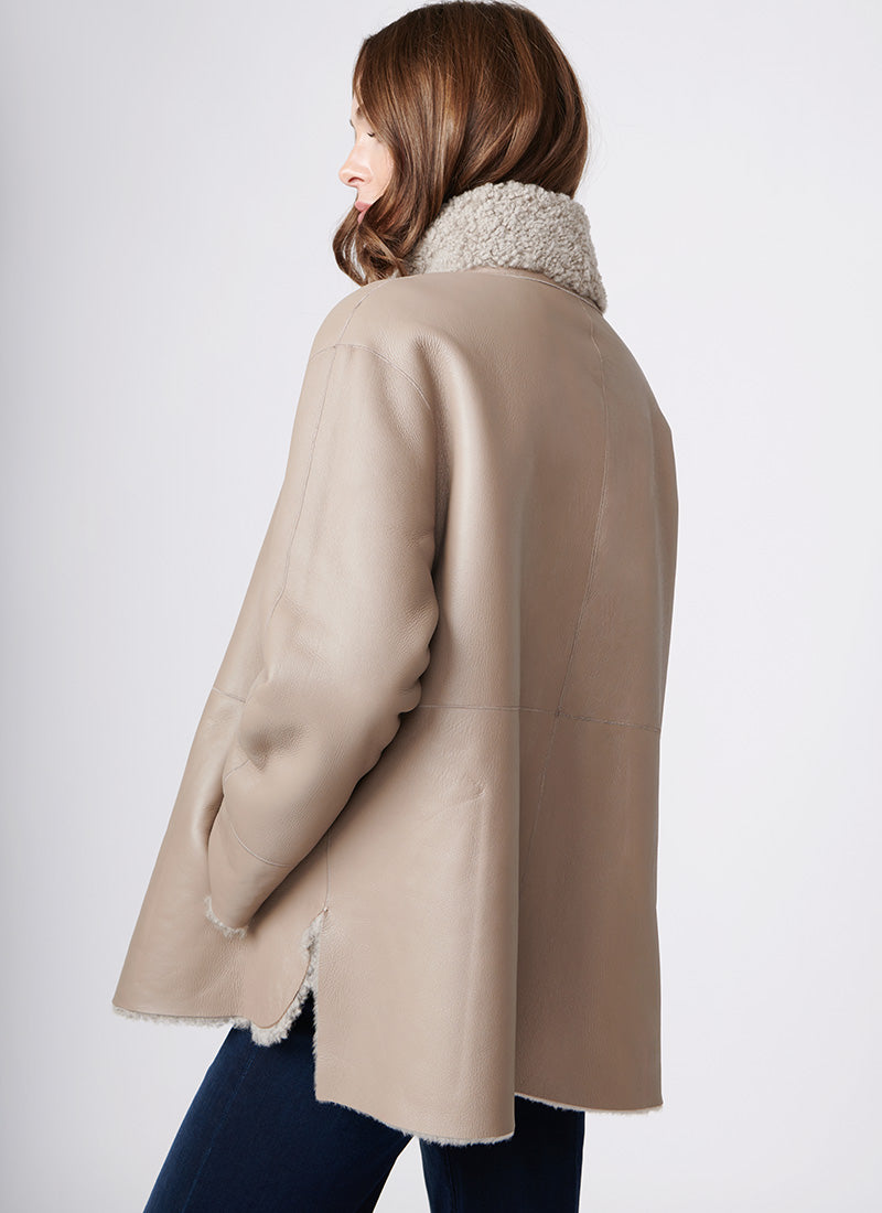 Suprema Stand Collar Textured Shearling Coat