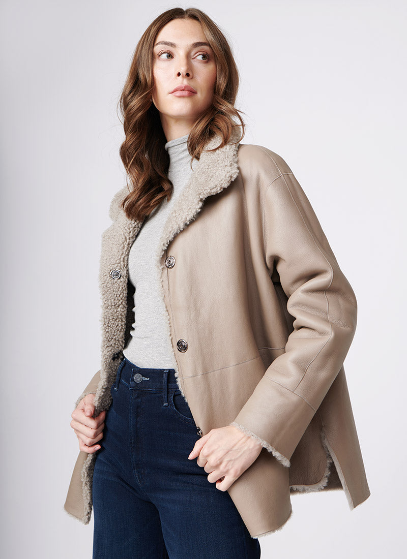 Suprema Stand Collar Textured Shearling Coat