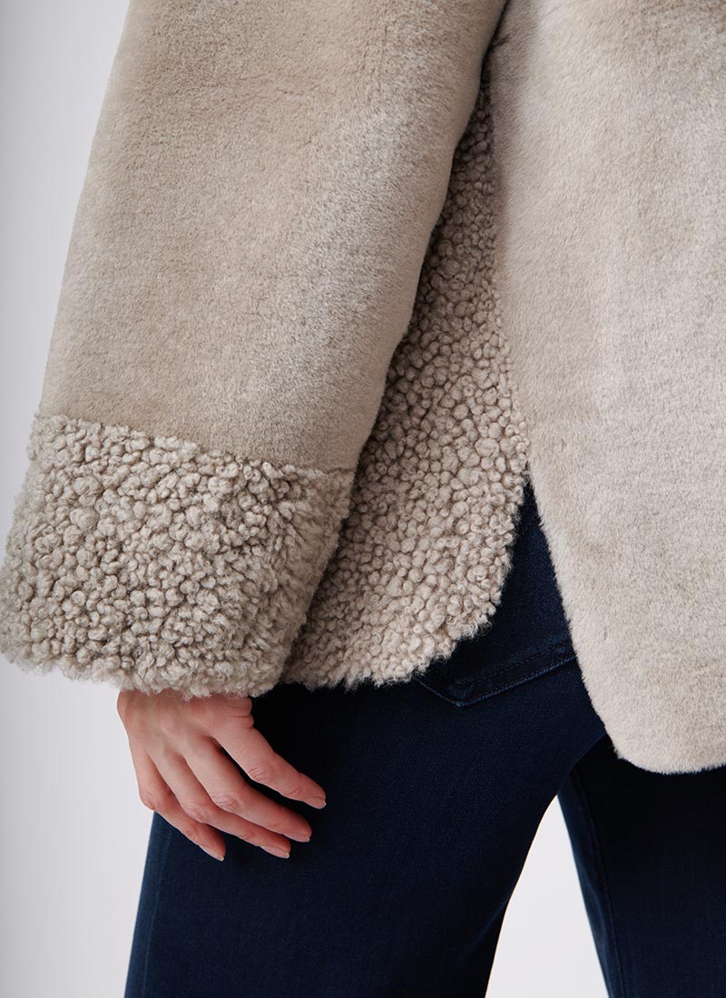 Suprema Stand Collar Textured Shearling Coat