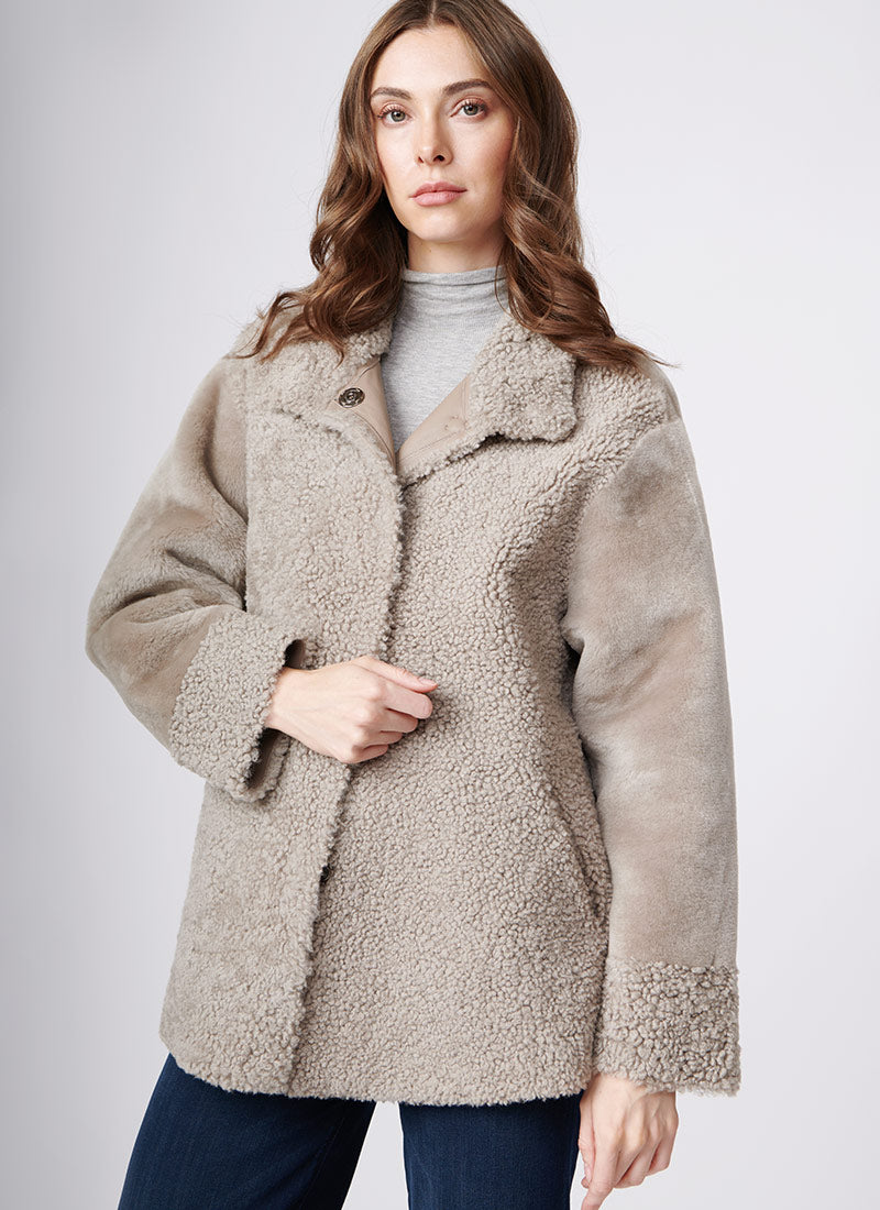 Suprema Stand Collar Textured Shearling Coat